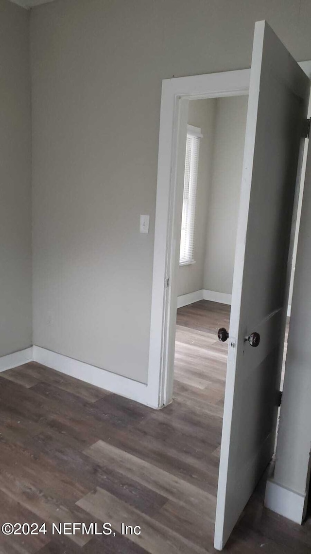 interior space featuring dark wood-type flooring