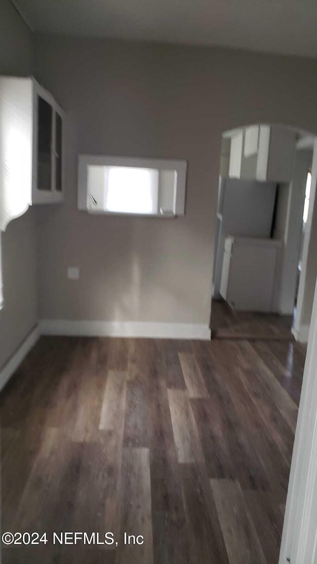 interior space featuring dark wood-type flooring