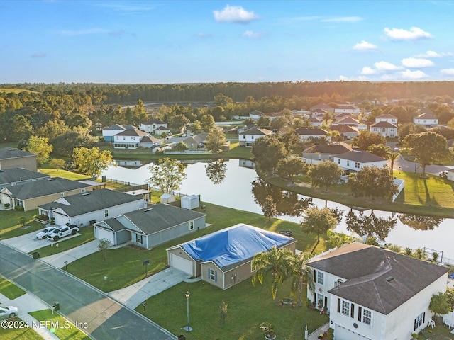 drone / aerial view with a water view