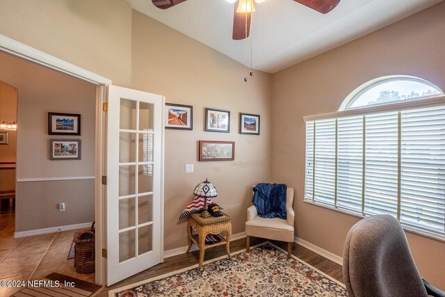 office with tile patterned flooring, lofted ceiling, and ceiling fan