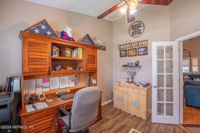 office area with ceiling fan and hardwood / wood-style flooring