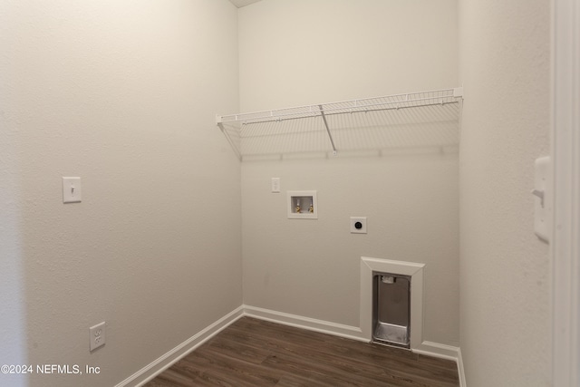 clothes washing area featuring hookup for an electric dryer, hookup for a washing machine, and dark wood-type flooring