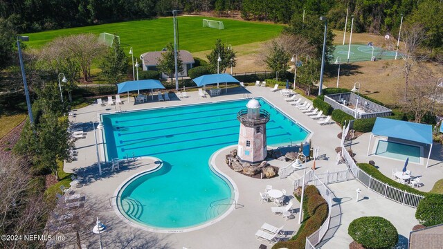 view of swimming pool with a patio area