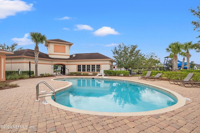 view of pool with a patio area