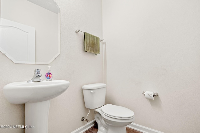 bathroom featuring toilet