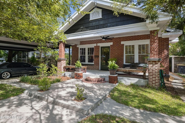 view of front of house with covered porch and ceiling fan