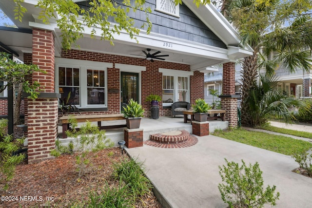 exterior space with covered porch and ceiling fan