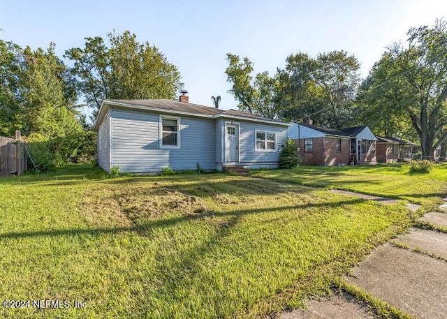 exterior space with a front yard