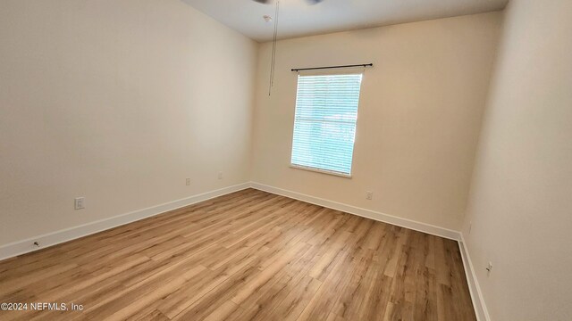 empty room with light wood-type flooring