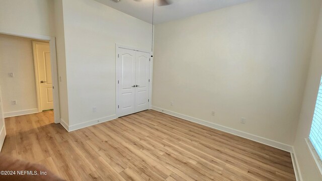 unfurnished bedroom featuring light hardwood / wood-style floors