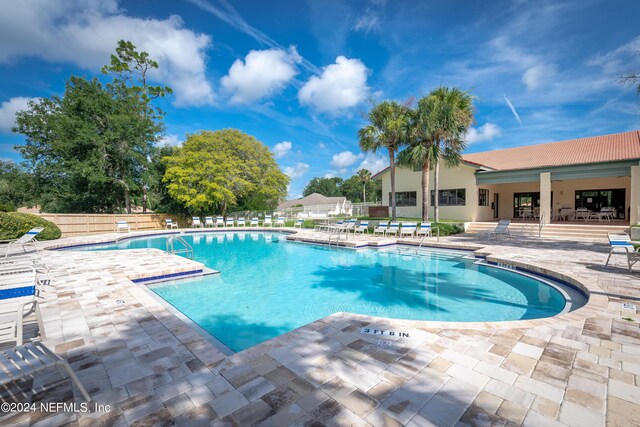 view of pool with a patio