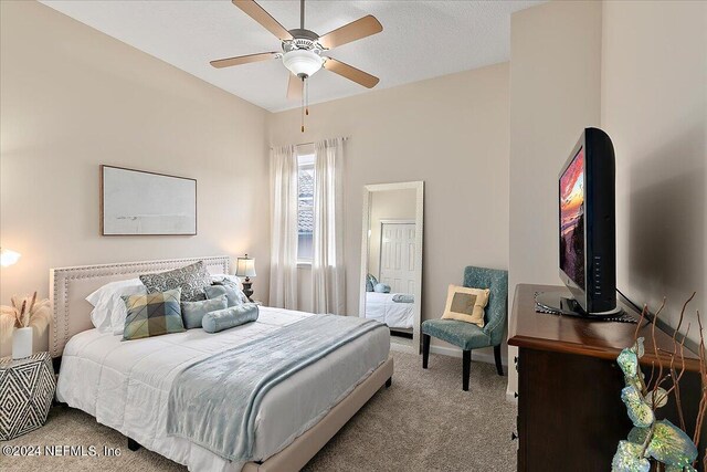 bedroom featuring carpet floors and ceiling fan