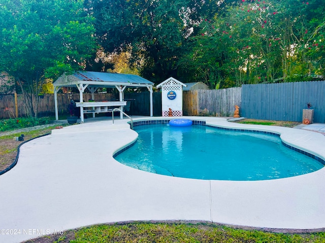 view of pool featuring a patio area and a gazebo