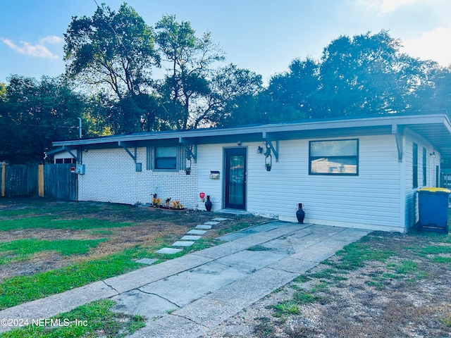 view of front of property with a patio area