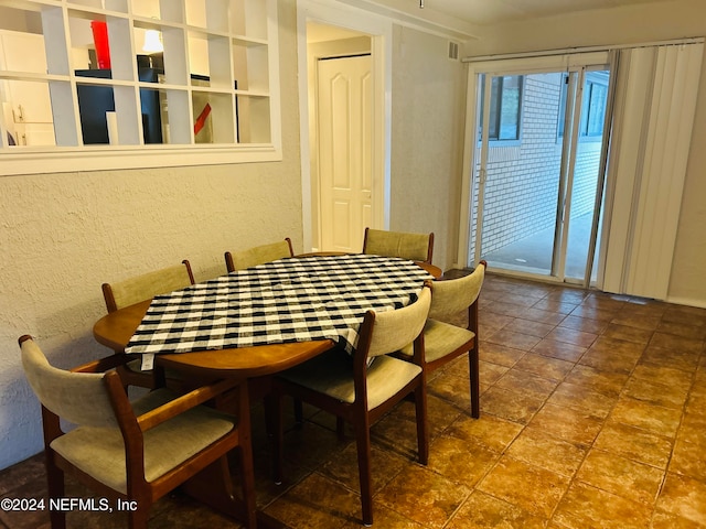 dining space featuring built in shelves