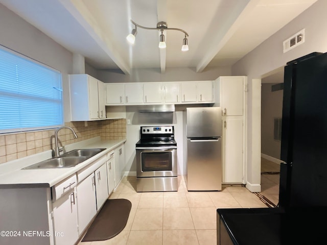 kitchen featuring sink, white cabinetry, beam ceiling, stainless steel appliances, and backsplash