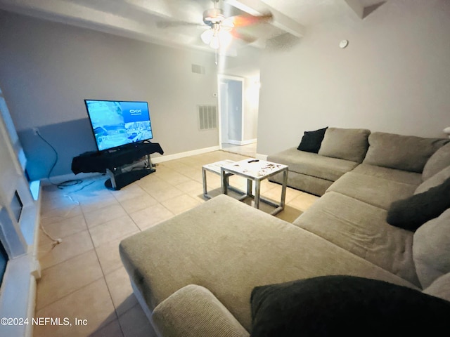 living room featuring ceiling fan and light tile patterned floors