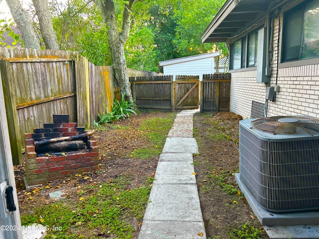 view of yard featuring central AC unit