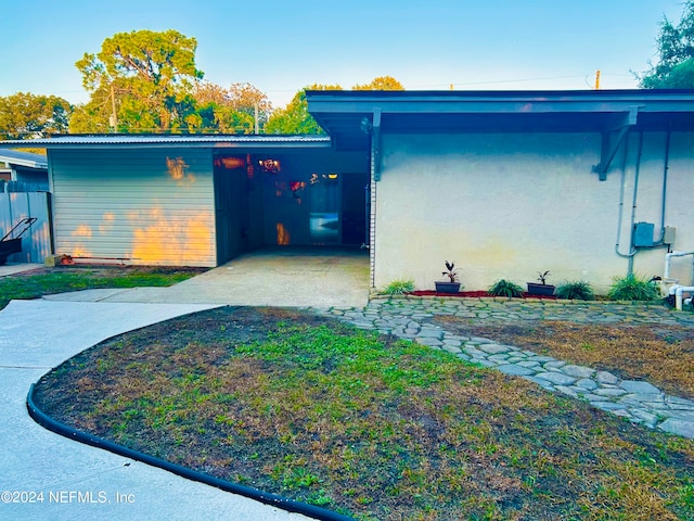 exterior space featuring a carport