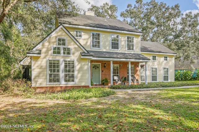 view of front of home featuring a front yard