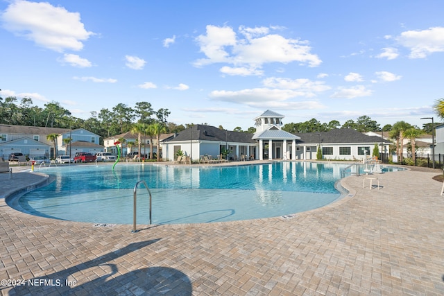 view of swimming pool with a patio area and a gazebo