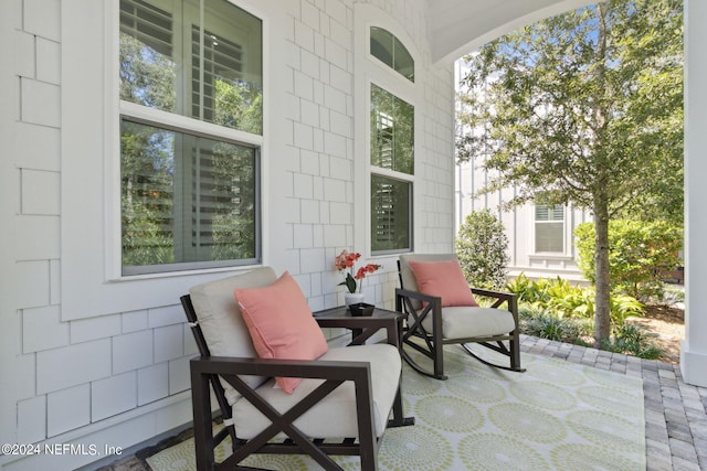 1505 Lakeside Ct, Fernandina Beach, FL 32034 - view of patio featuring covered porch