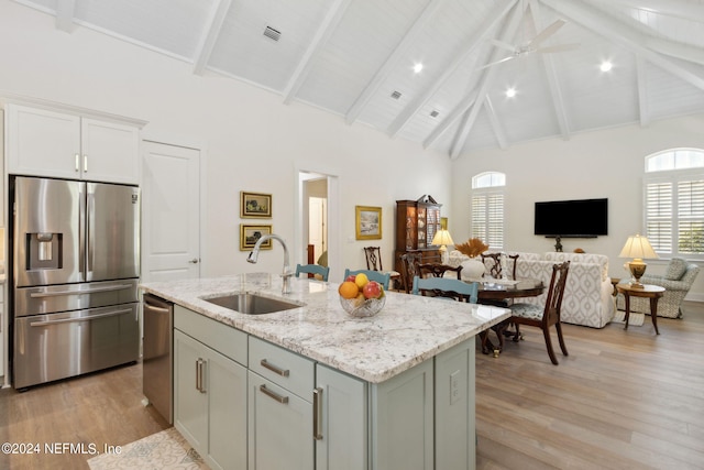 1505 Lakeside Ct, Fernandina Beach, FL 32034 - kitchen with open floor plan, a sink, appliances with stainless steel finishes, and a wealth of natural light