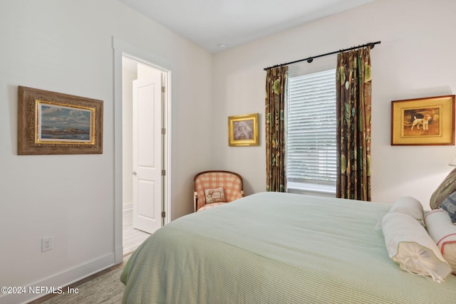 1505 Lakeside Ct, Fernandina Beach, FL 32034 - carpeted bedroom featuring baseboards