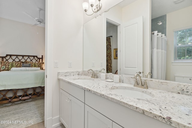 1505 Lakeside Ct, Fernandina Beach, FL 32034 - bathroom with double vanity, ensuite bath, wood finished floors, and a sink