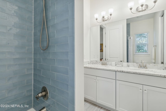 1505 Lakeside Ct, Fernandina Beach, FL 32034 - bathroom with double vanity, shower / tub combo with curtain, a sink, and a chandelier