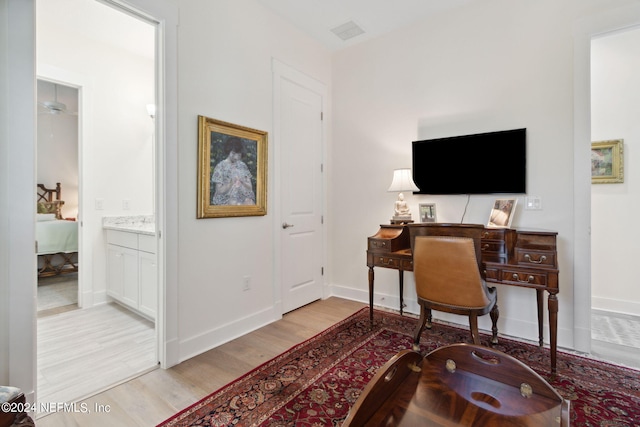 1505 Lakeside Ct, Fernandina Beach, FL 32034 - office space featuring baseboards, visible vents, and wood finished floors