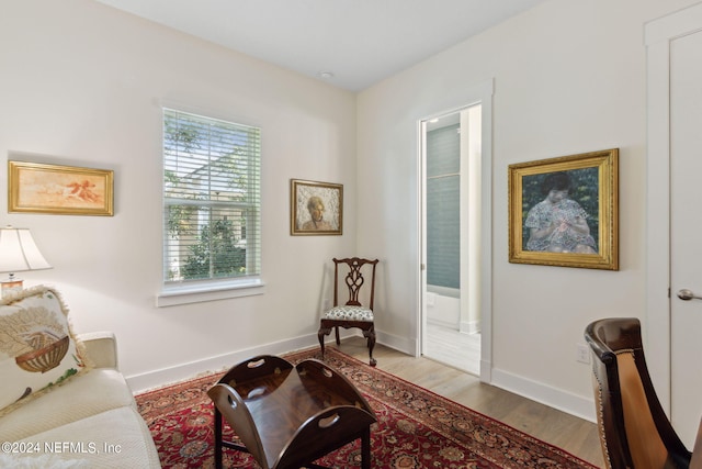 1505 Lakeside Ct, Fernandina Beach, FL 32034 - sitting room with baseboards and wood finished floors