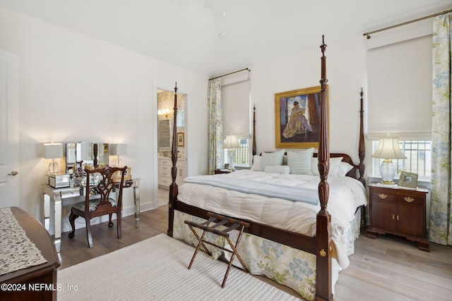 1505 Lakeside Ct, Fernandina Beach, FL 32034 - bedroom with ensuite bath and light wood finished floors
