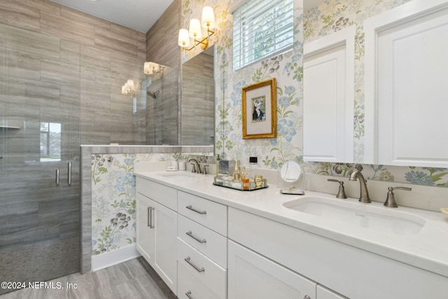 1505 Lakeside Ct, Fernandina Beach, FL 32034 - full bath featuring a sink, an inviting chandelier, a shower stall, and wallpapered walls