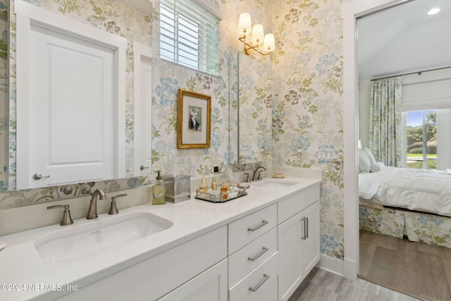 1505 Lakeside Ct, Fernandina Beach, FL 32034 - full bathroom featuring connected bathroom, wallpapered walls, and a sink