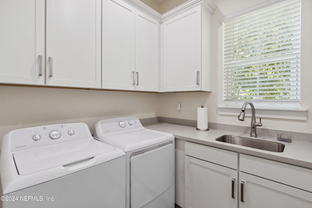 1505 Lakeside Ct, Fernandina Beach, FL 32034 - laundry area featuring a sink, cabinet space, and washing machine and dryer