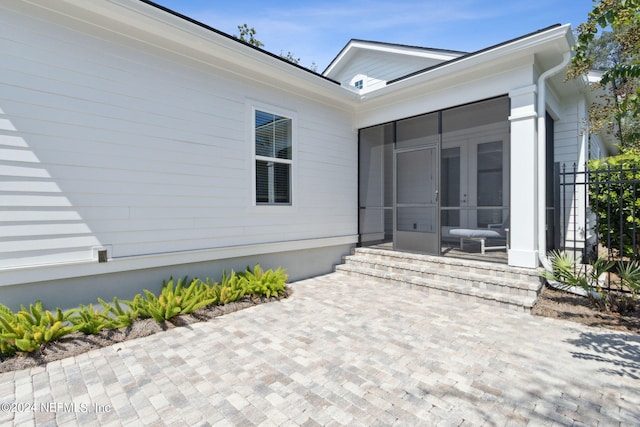1505 Lakeside Ct, Fernandina Beach, FL 32034 - view of patio with a sunroom