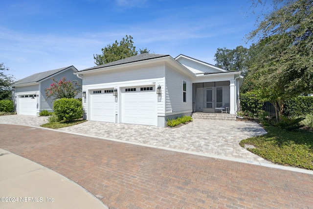 1505 Lakeside Ct, Fernandina Beach, FL 32034 - ranch-style house with driveway and an attached garage
