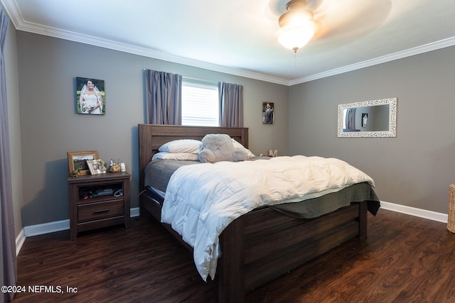 bedroom with dark hardwood / wood-style floors, ceiling fan, and ornamental molding