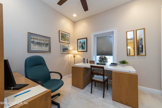 carpeted office with ceiling fan