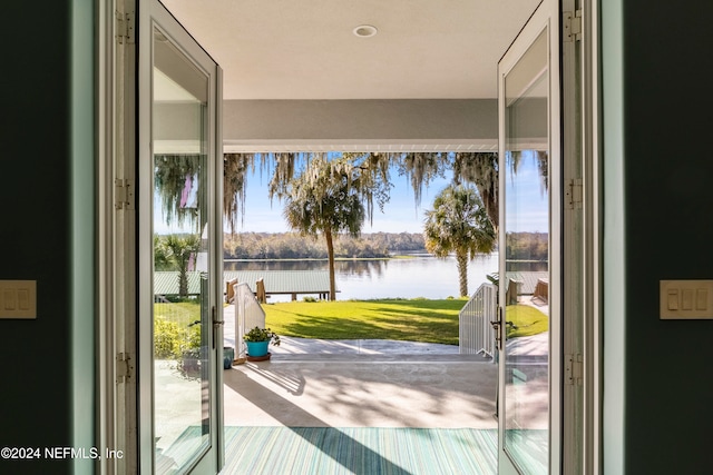 entryway with a water view