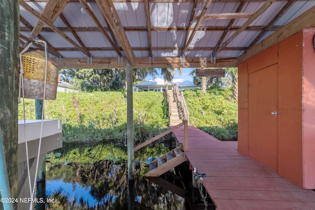 deck featuring a water view