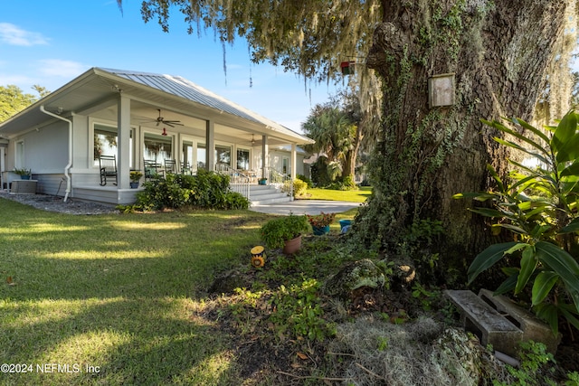 exterior space featuring ceiling fan and a porch