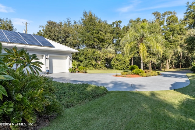 view of yard with a garage