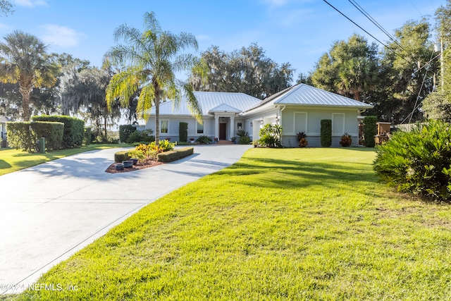 ranch-style house with a front yard