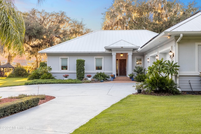 view of front of home with a front yard