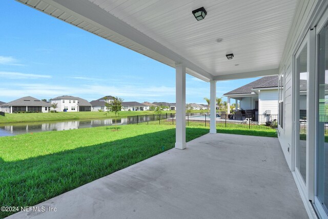 view of patio / terrace featuring a water view