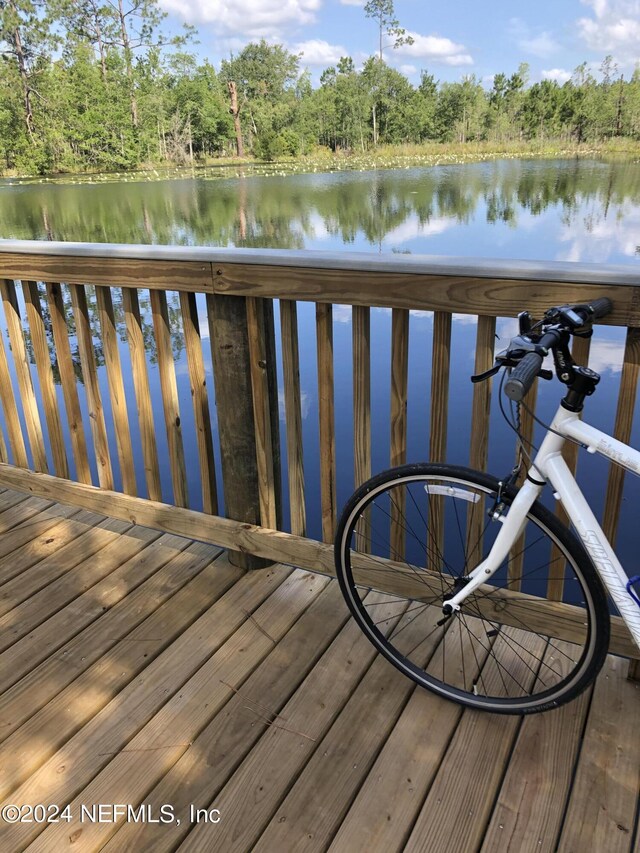 deck featuring a water view