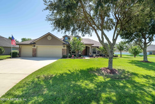 single story home with a front lawn and a garage