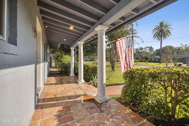 view of patio featuring a porch